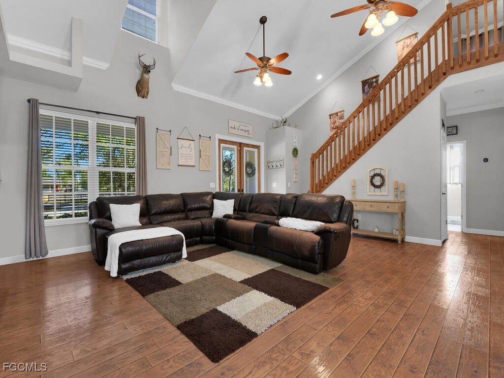 6041 Alan Boulevard Punta Gorda, FL 33982 - Photo 13 of 44 a living room with furniture and a large window