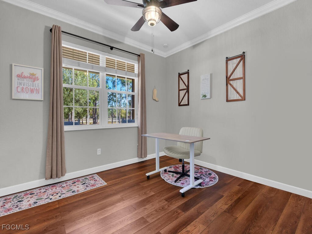 6041 Alan Boulevard Punta Gorda, FL 33982 - Photo 30 of 44 a view of a room with wooden floor and window