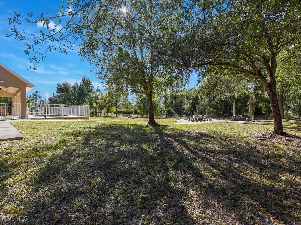 6041 Alan Boulevard Punta Gorda, FL 33982 - Photo 37 of 44 a view of outdoor space with garden view