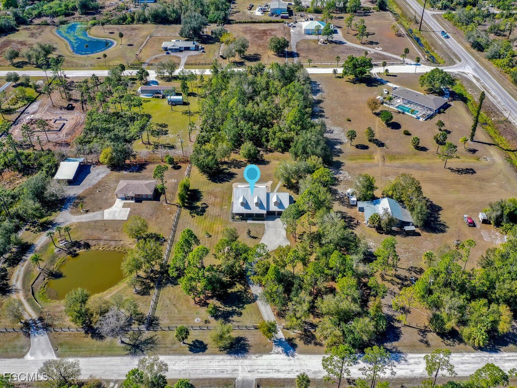 6041 Alan Boulevard Punta Gorda, FL 33982 - Photo 43 of 44 an aerial view of residential houses with outdoor space