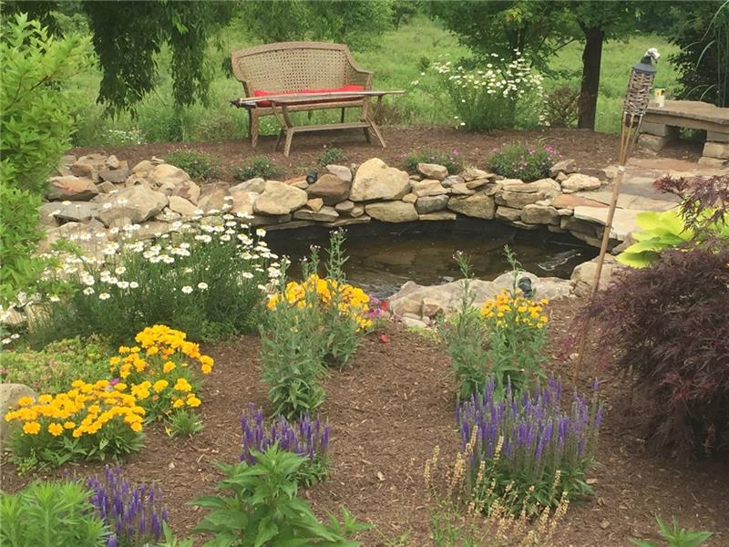 2510 Butler Logan Road Tarentum, PA 15084 - Photo 19 of 25 scenic sitting area with pond