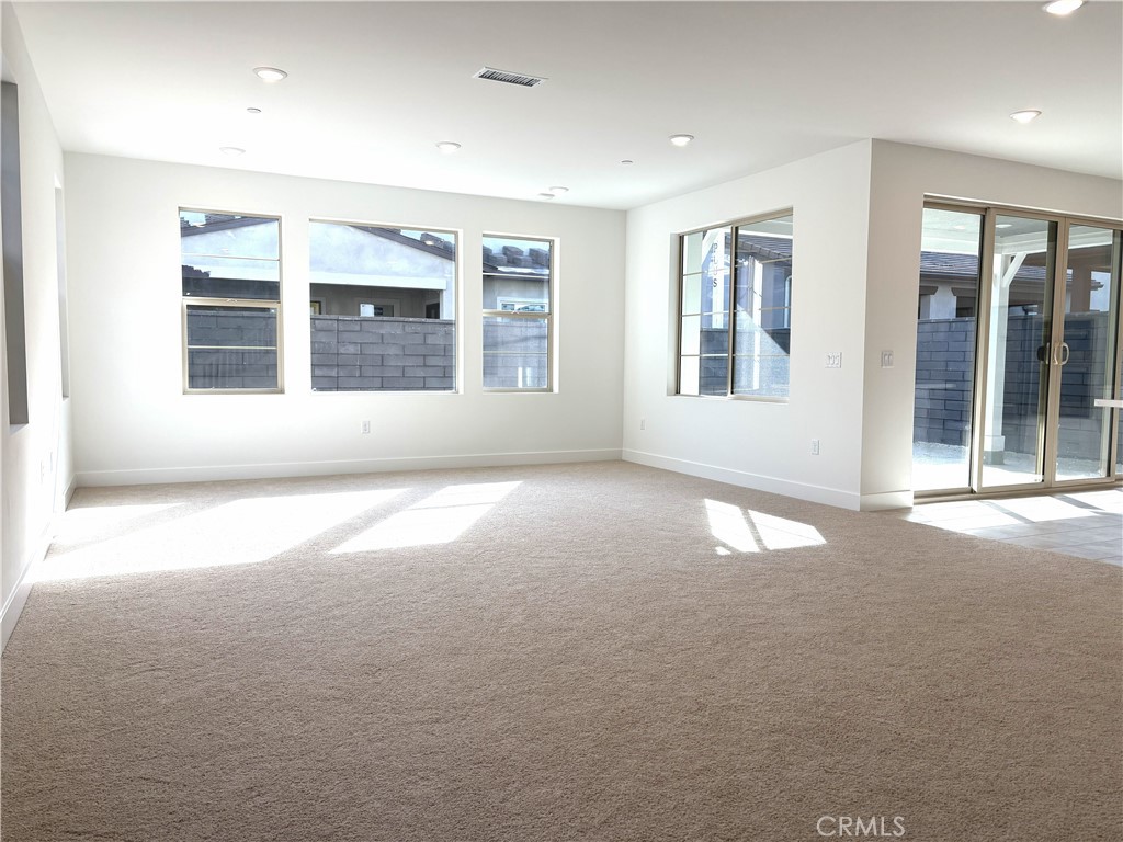 5168 Solace Drive Rancho Mission Viejo, CA 92694 - Photo 6 of 23 a view of an empty room with a window