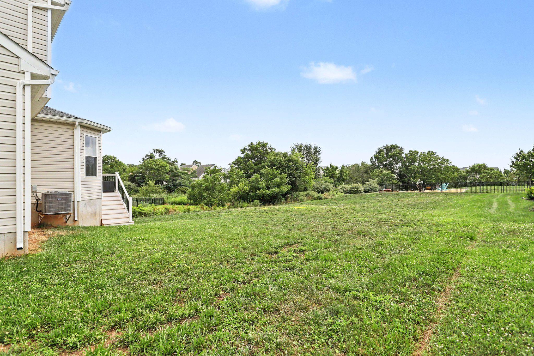 40 Butter Road York, PA 17404 - Photo 35 of 38 Spacious green yard with serene views.