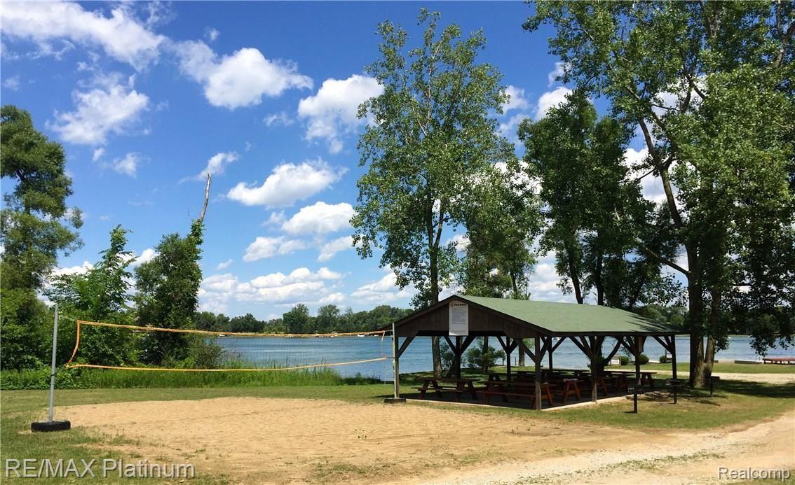 9335 Bennett Lake Road Fenton, MI 48430 - Photo 2 of 33 Game of Volleyball, anyone?