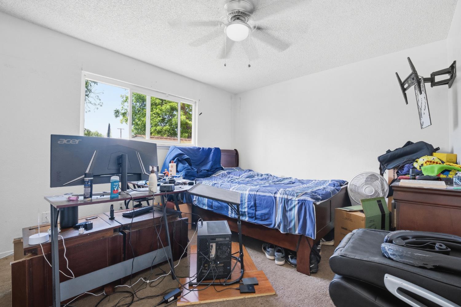 2250 Emerson Avenue Merced, CA 95341 - Photo 8 of 12 a bedroom with furniture and a window