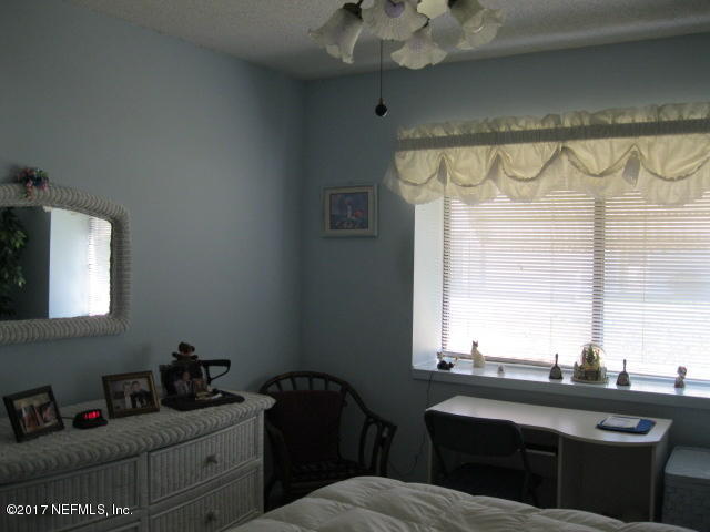 3405 Ricky Court Jacksonville, FL 32223 - Photo 12 of 15 a kitchen with a sink cabinets and window