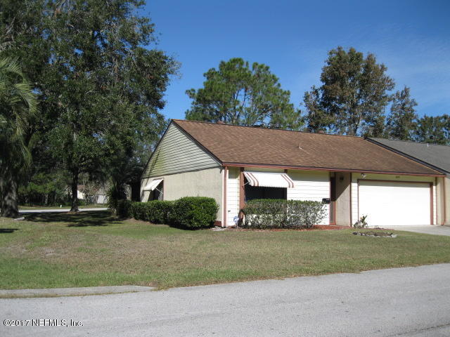 3405 Ricky Court Jacksonville, FL 32223 - Photo 2 of 15 a view of house with a yard