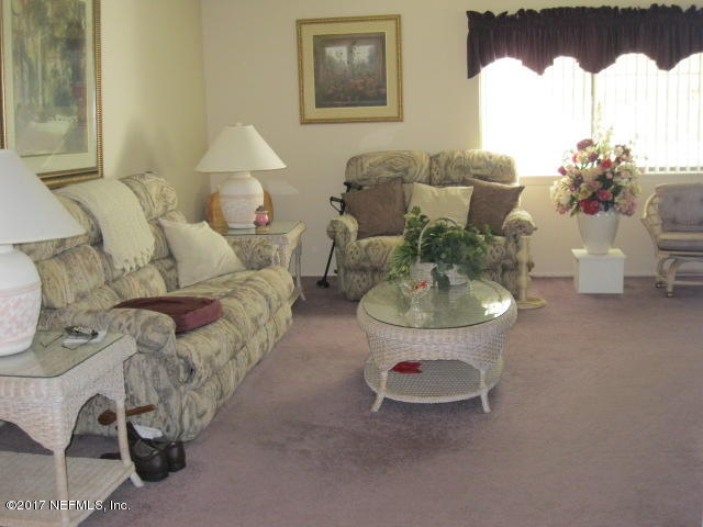 3405 Ricky Court Jacksonville, FL 32223 - Photo 6 of 15 a living room with furniture flowerpot and a window