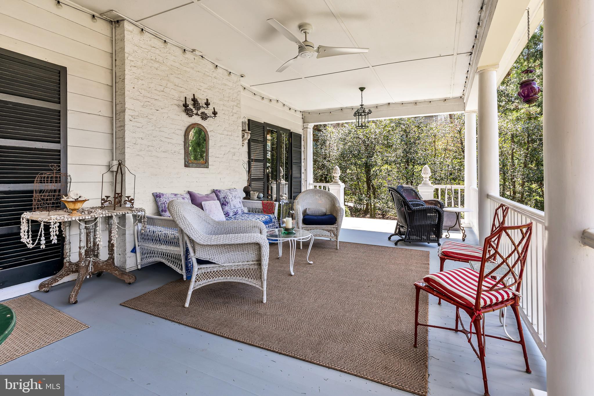 2 Hillside Road Baltimore, MD 21210 - Photo 13 of 79 a living room with furniture a flat screen tv and a large window