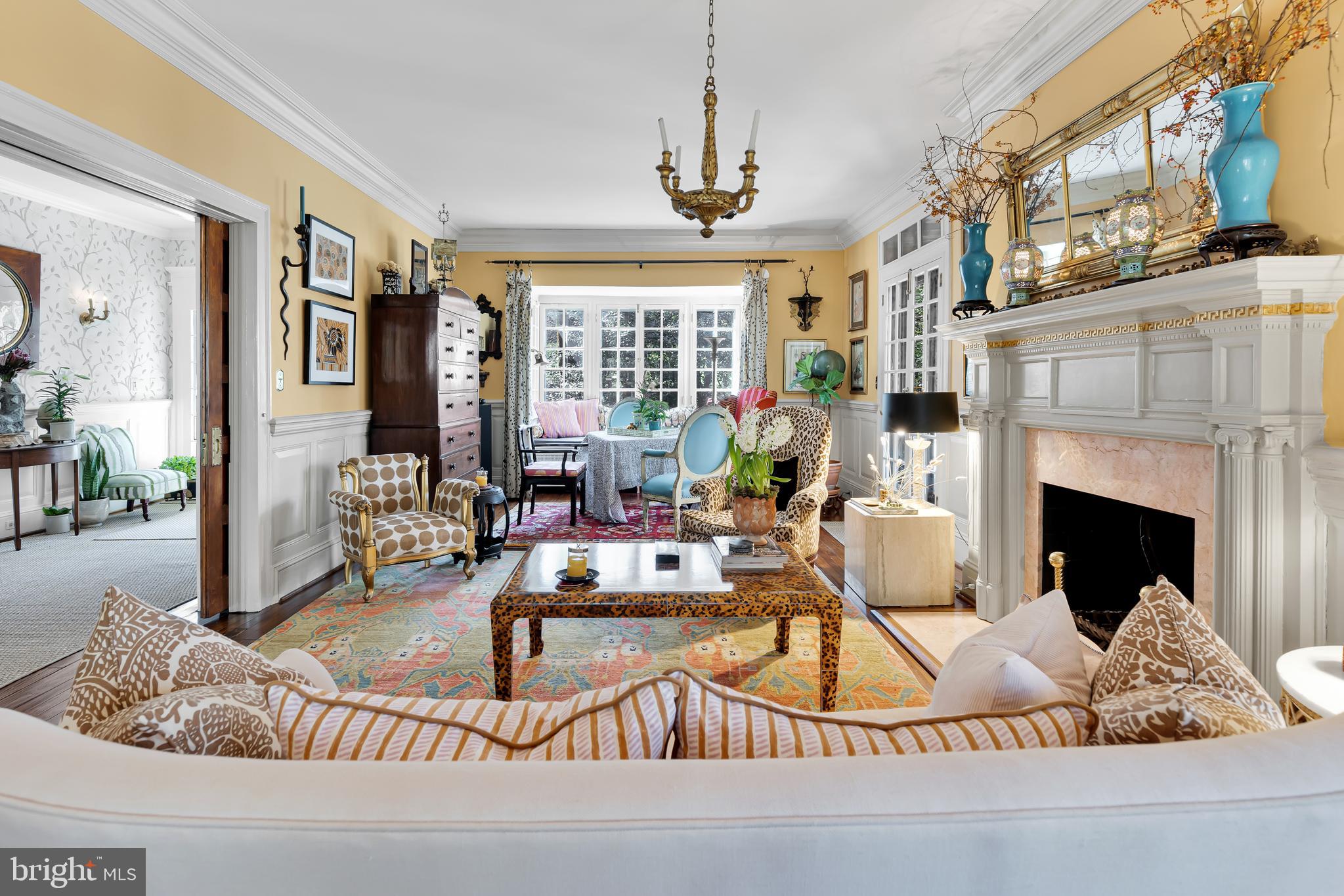 2 Hillside Road Baltimore, MD 21210 - Photo 15 of 79 a living room with furniture a fireplace and a large window