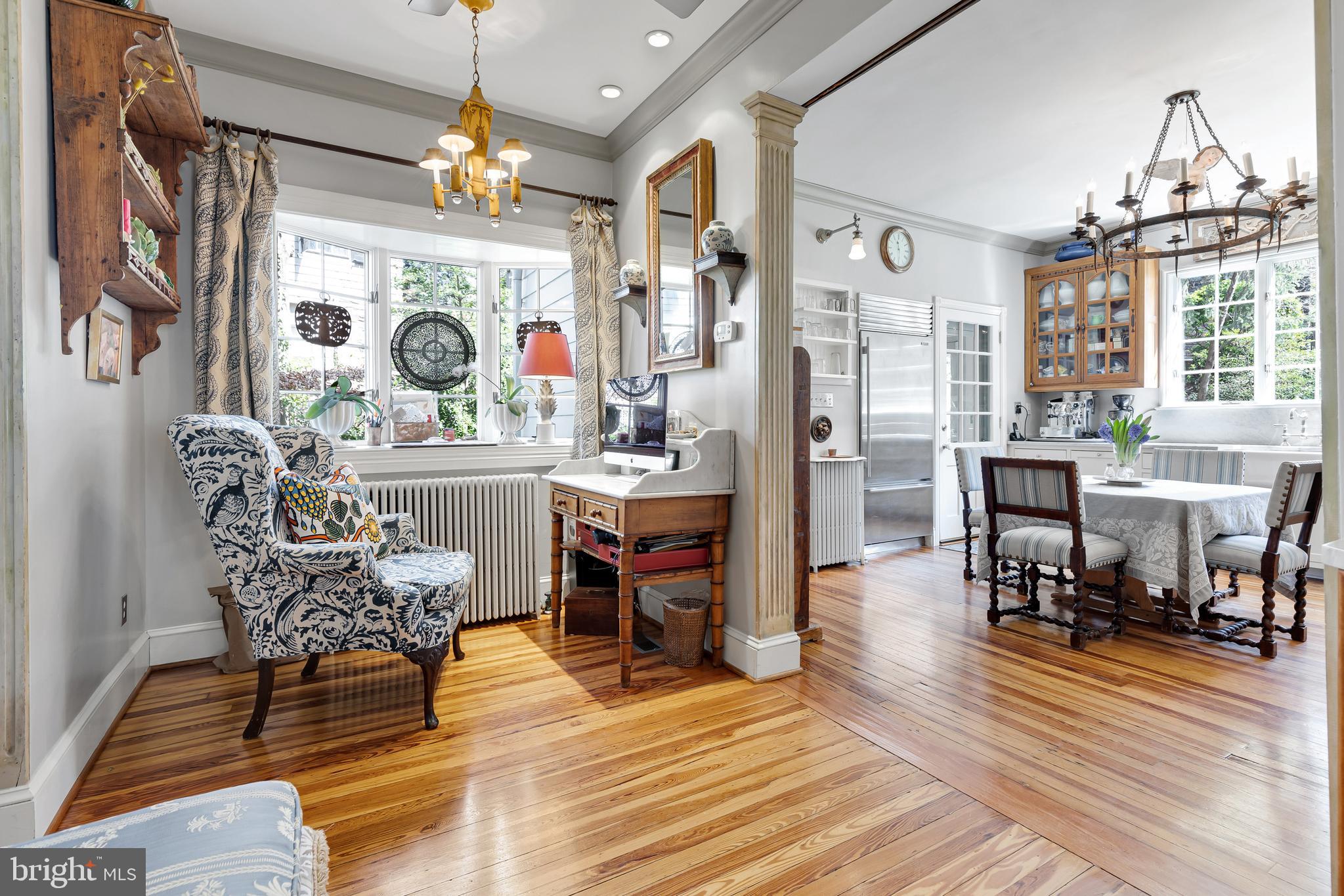 2 Hillside Road Baltimore, MD 21210 - Photo 20 of 79 a living room filled with furniture and a chandelier