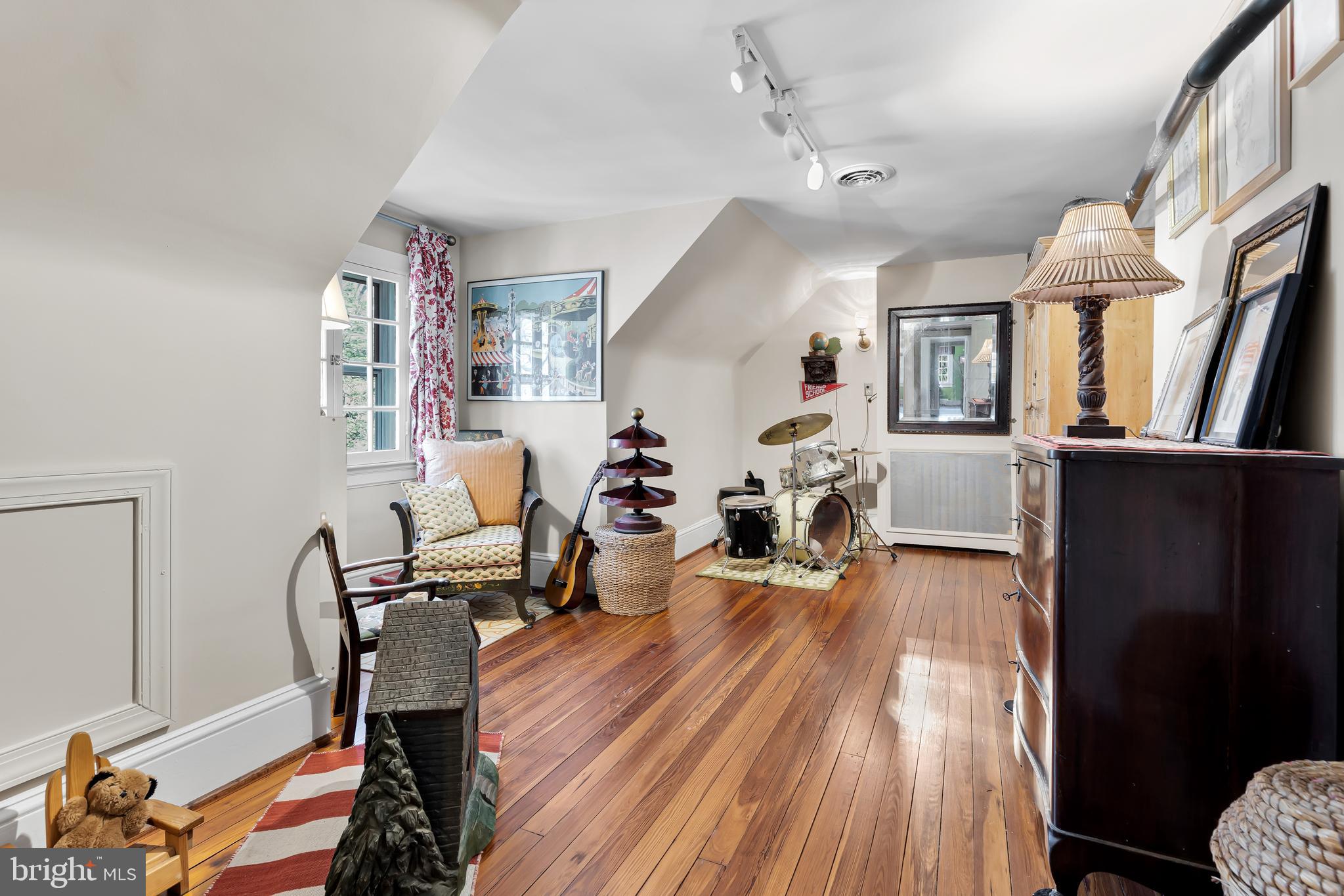 2 Hillside Road Baltimore, MD 21210 - Photo 65 of 79 a living room with furniture and a wooden floor