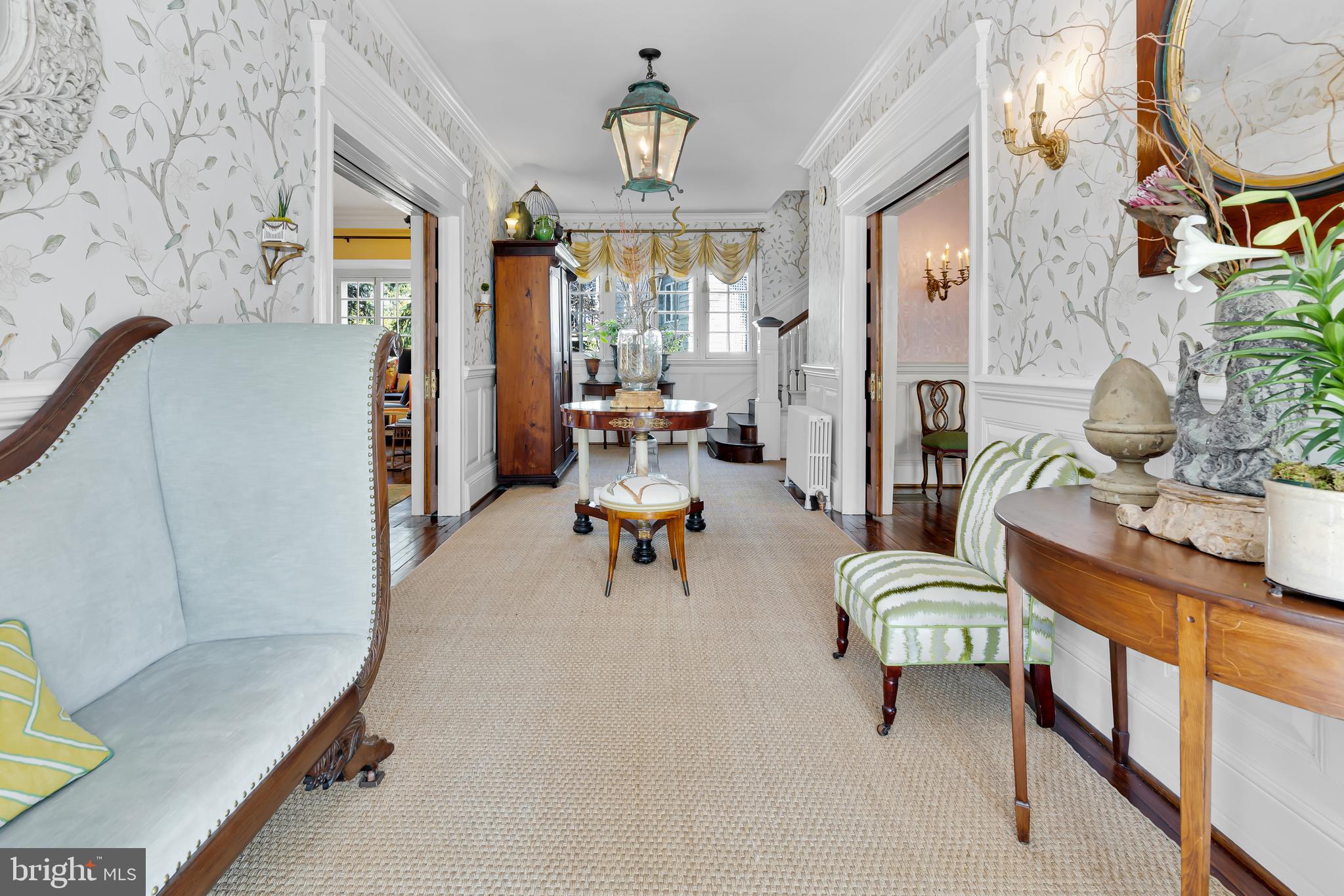 2 Hillside Road Baltimore, MD 21210 - Photo 7 of 79 a living room with furniture and a chandelier