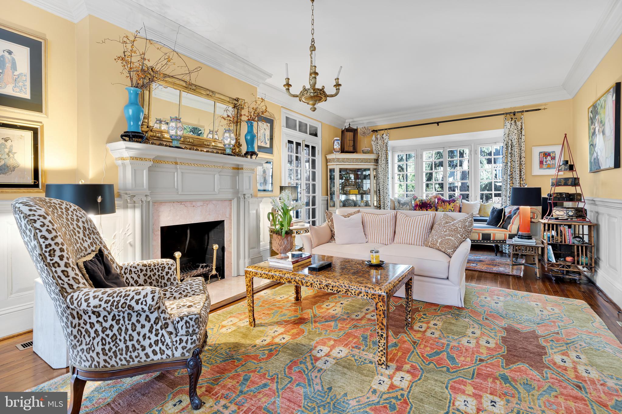 2 Hillside Road Baltimore, MD 21210 - Photo 8 of 79 a living room with furniture a chandelier and a fireplace