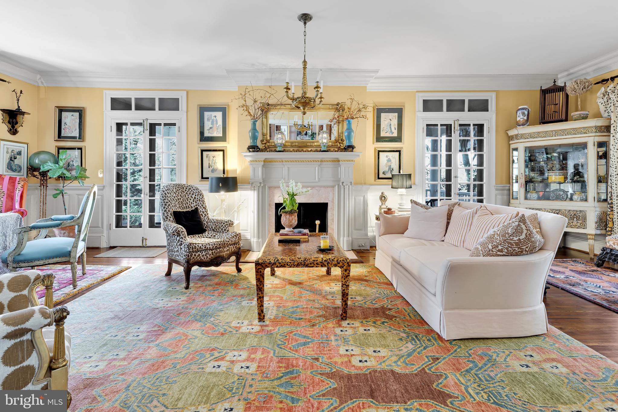 2 Hillside Road Baltimore, MD 21210 - Photo 9 of 79 a living room with furniture a fireplace and a chandelier