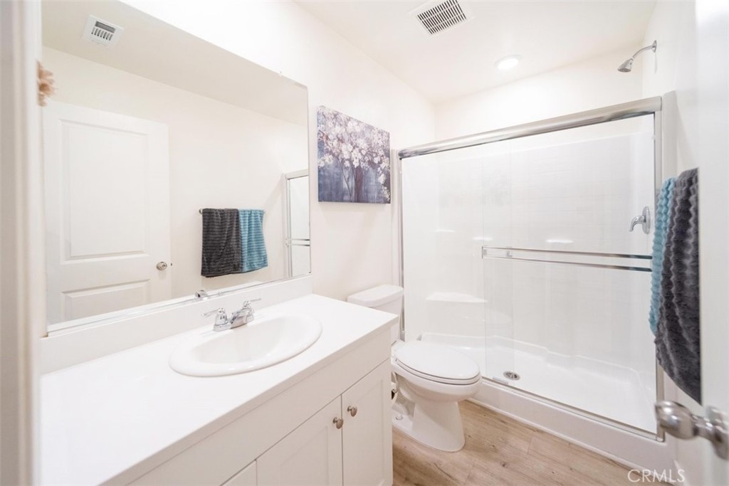 32078 Rambling Court Winchester, CA 92596 - Photo 22 of 48 a bathroom with a sink toilet and shower