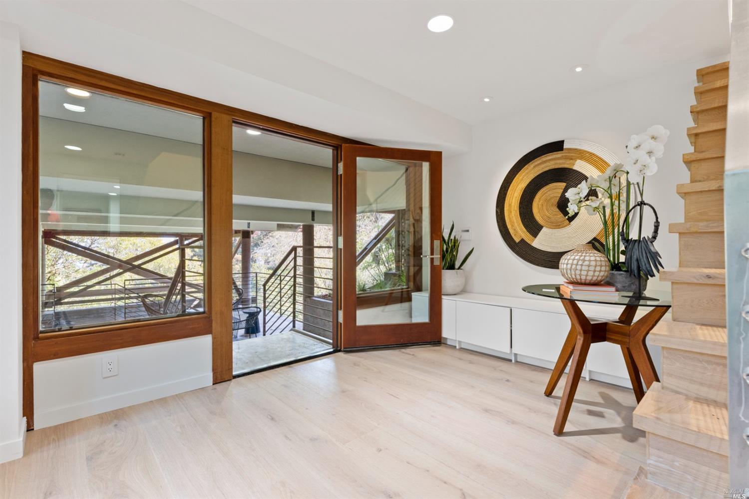 655 Edgewood Avenue Mill Valley, CA 94941 - Photo 19 of 85 a view of a room with furniture and a large window