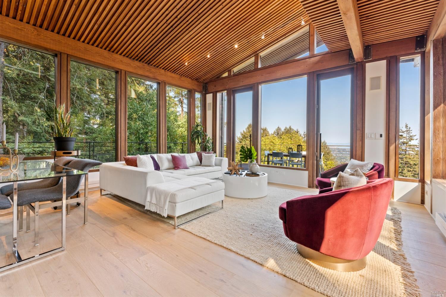655 Edgewood Avenue Mill Valley, CA 94941 - Photo 31 of 85 a living room with furniture and a large window