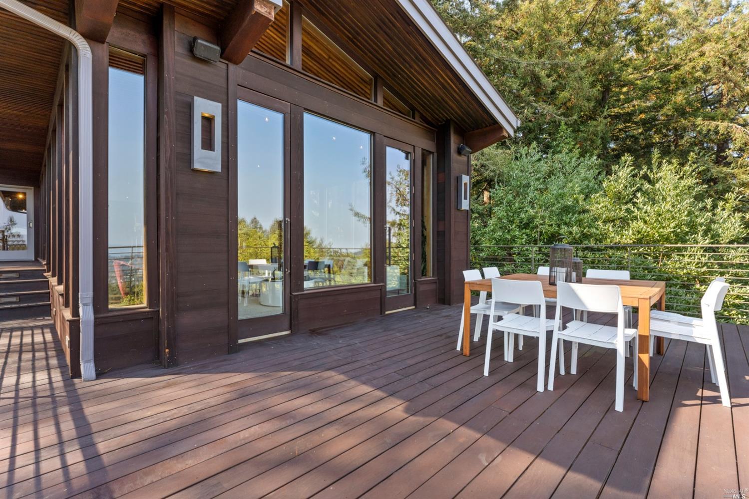655 Edgewood Avenue Mill Valley, CA 94941 - Photo 36 of 85 a view of a patio with table and chairs and couches