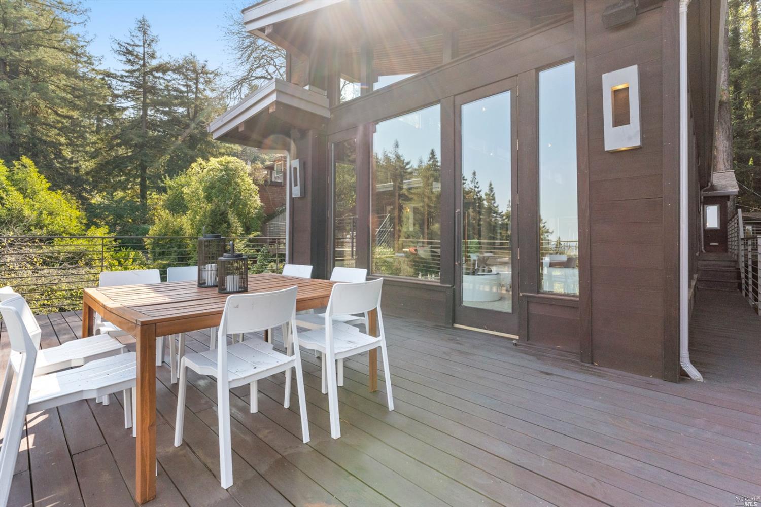 655 Edgewood Avenue Mill Valley, CA 94941 - Photo 37 of 85 a view of a dining room with furniture window and wooden floor