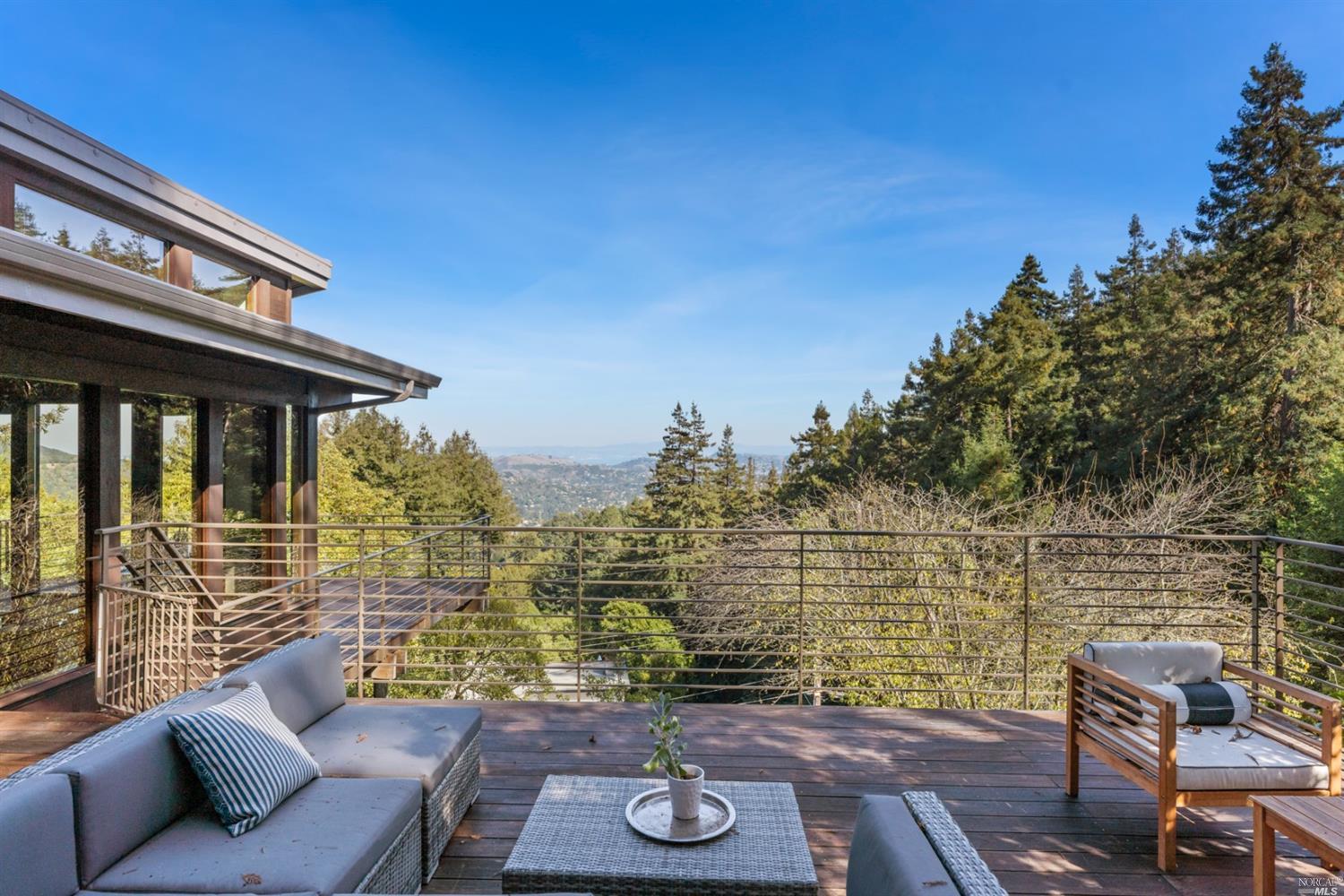 655 Edgewood Avenue Mill Valley, CA 94941 - Photo 40 of 85 a view of a patio with couches chairs and wooden floor