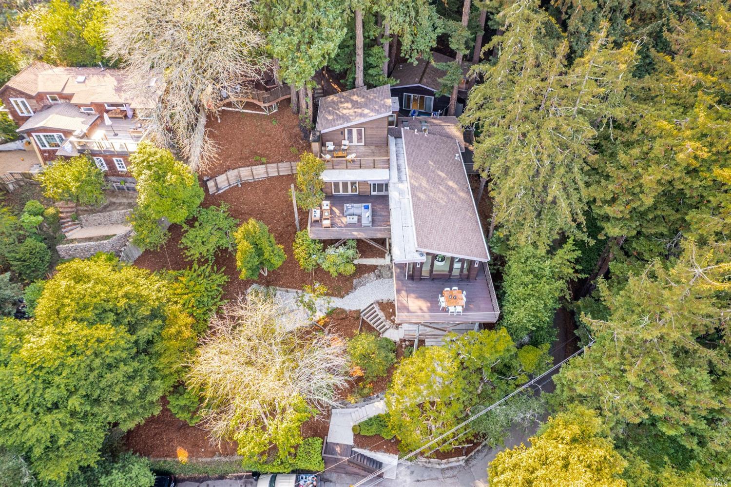 655 Edgewood Avenue Mill Valley, CA 94941 - Photo 5 of 85 a aerial view of a house with a yard swimming pool and outdoor seating