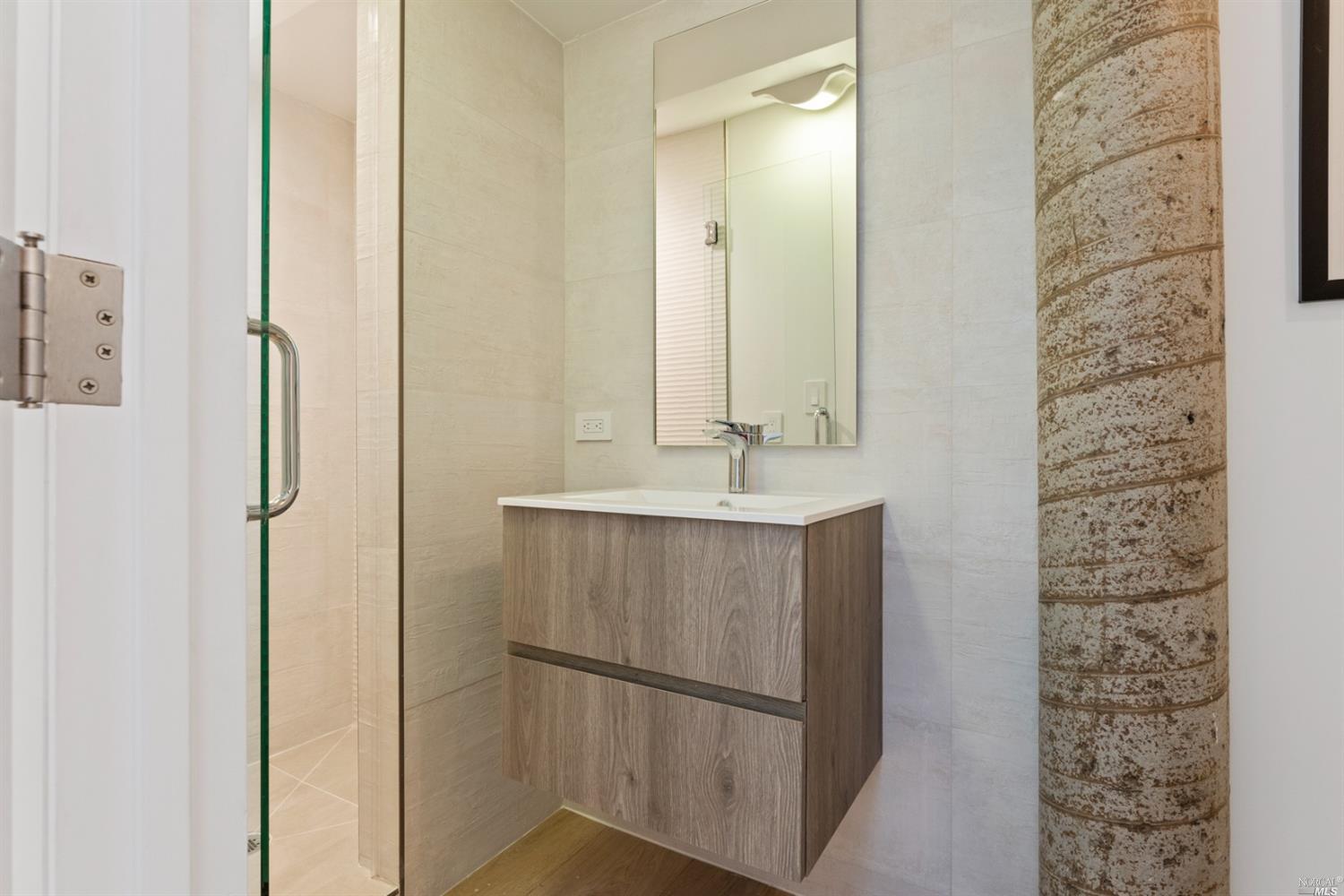 655 Edgewood Avenue Mill Valley, CA 94941 - Photo 45 of 85 a bathroom with a shower and a sink