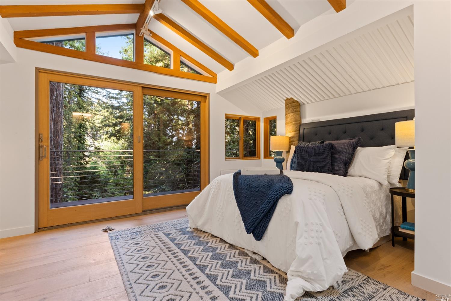 655 Edgewood Avenue Mill Valley, CA 94941 - Photo 47 of 85 a bed sitting in a bedroom next to a window