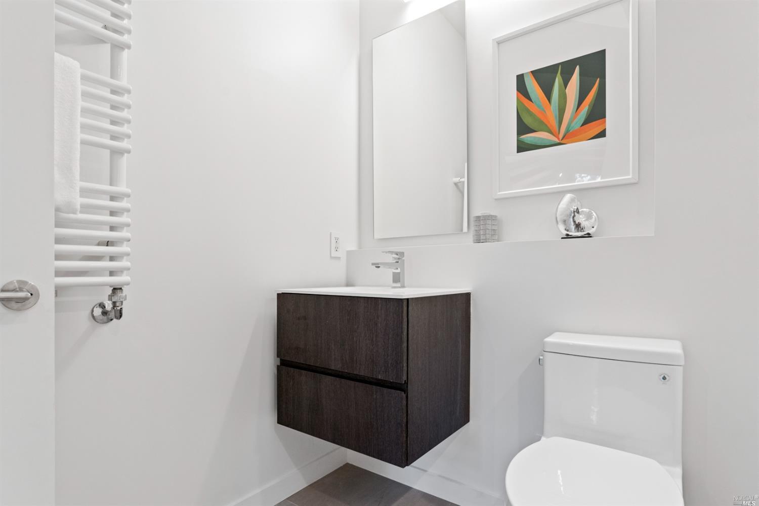 655 Edgewood Avenue Mill Valley, CA 94941 - Photo 53 of 85 a bathroom with a toilet a sink and mirror