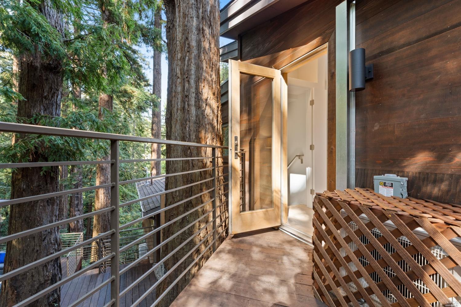 655 Edgewood Avenue Mill Valley, CA 94941 - Photo 63 of 85 a view of balcony with wooden floor and fence