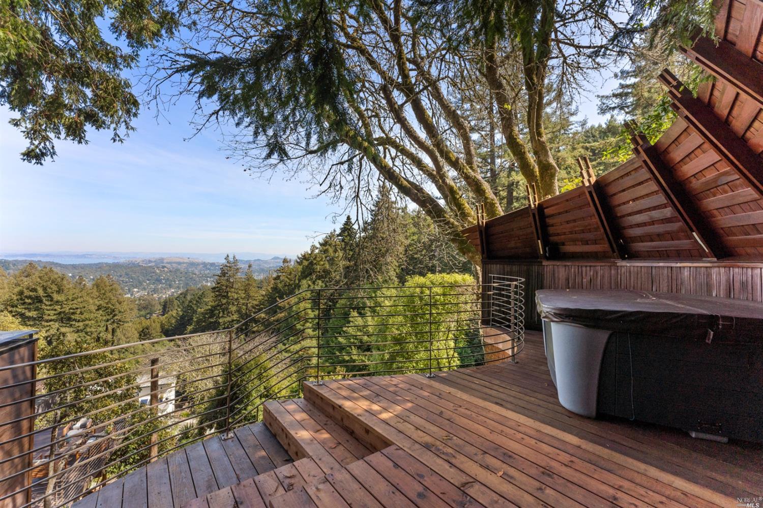 655 Edgewood Avenue Mill Valley, CA 94941 - Photo 68 of 85 a view of a balcony with wooden floor and fence