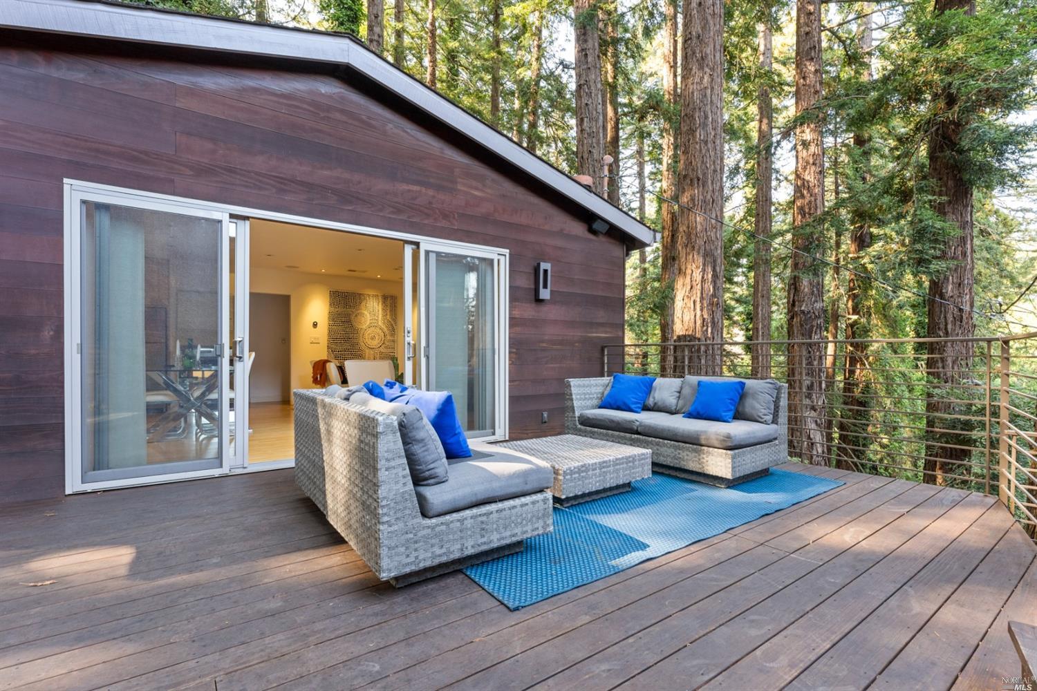 655 Edgewood Avenue Mill Valley, CA 94941 - Photo 70 of 85 a view of a patio with couches and potted plants