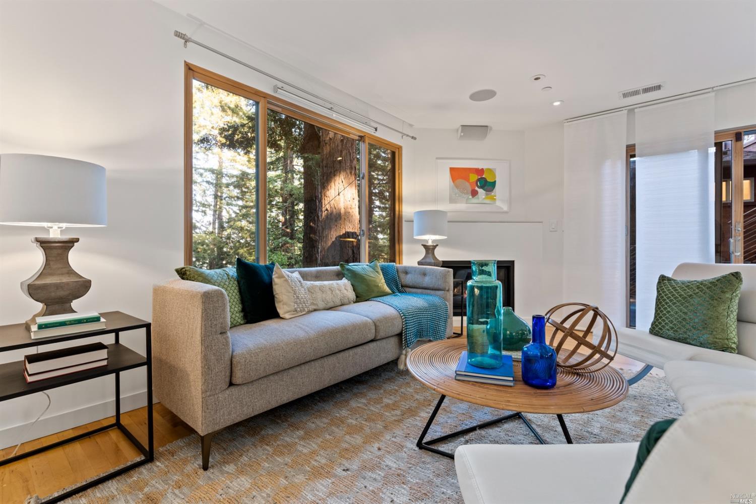 655 Edgewood Avenue Mill Valley, CA 94941 - Photo 73 of 85 a living room with fireplace furniture and a table