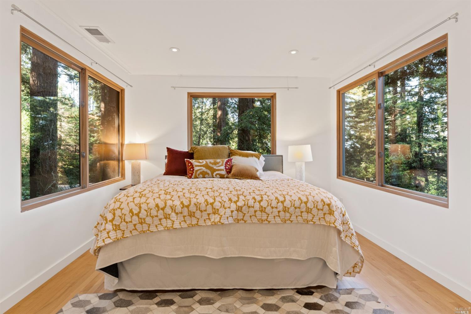 655 Edgewood Avenue Mill Valley, CA 94941 - Photo 79 of 85 a large bed sitting in a bedroom next to a window