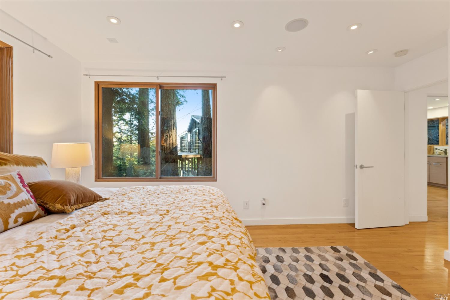 655 Edgewood Avenue Mill Valley, CA 94941 - Photo 80 of 85 a bedroom with a bed and a window