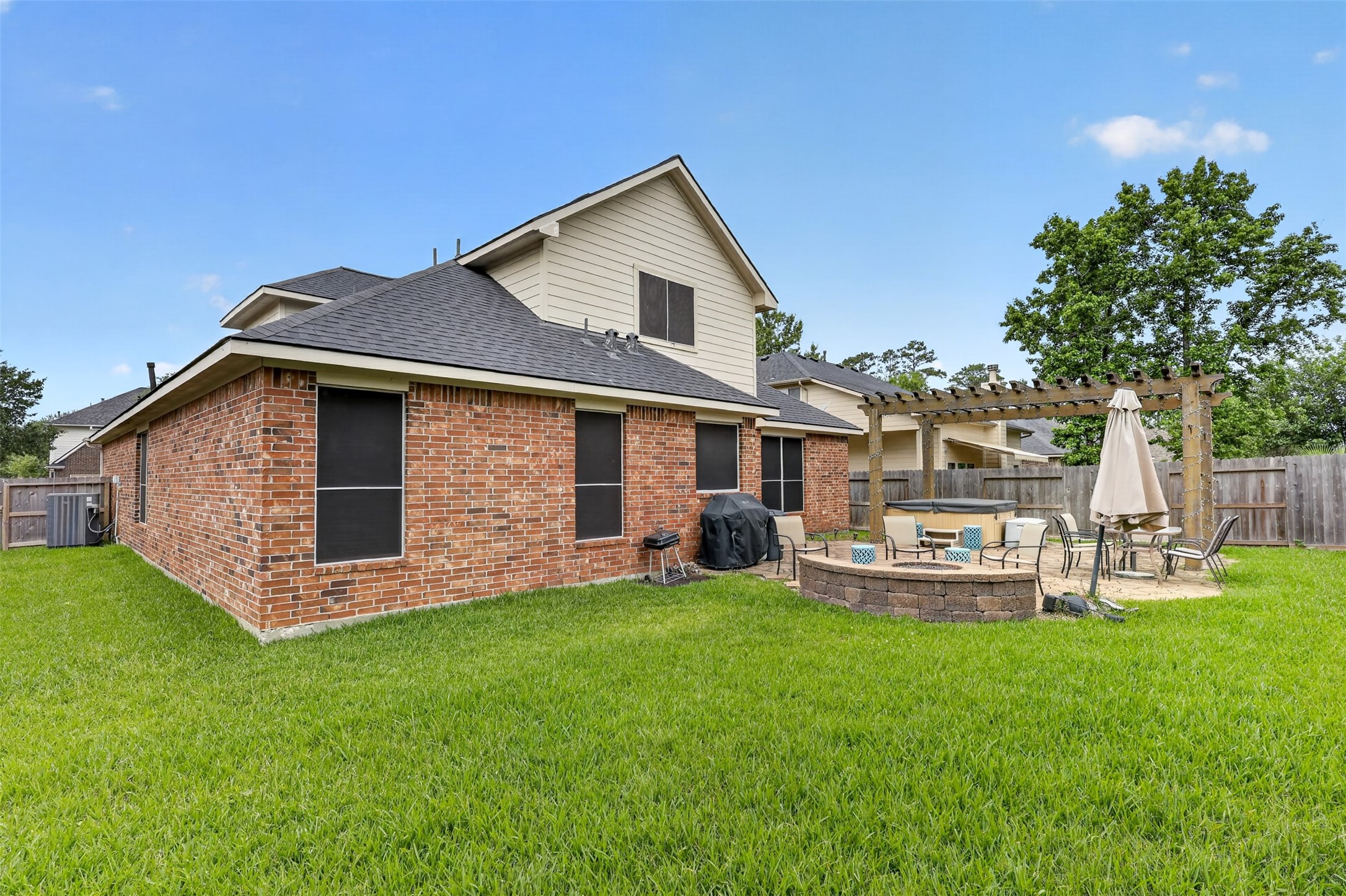 25710 Crisp Spring Lane Spring, TX 77373 - Photo 29 of 37 Backyard Full View
Large, fully fenced backyard offering privacy, green space, and multiple areas for relaxation and entertainment.