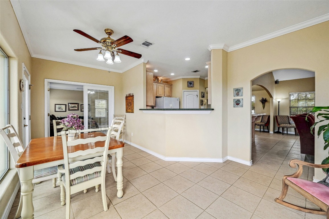 1370 Sunset View Fischer, TX 78623 - Photo 13 of 28 a view of a livingroom with furniture and a dining table with wooden floor
