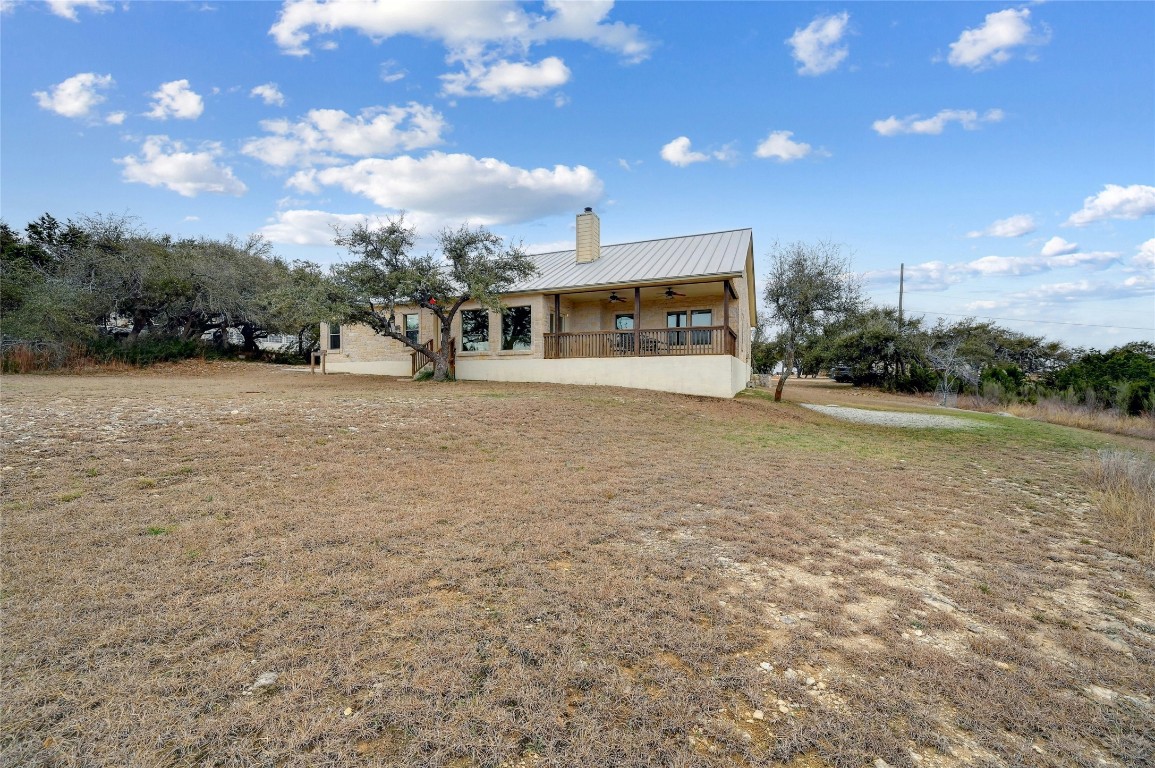 1370 Sunset View Fischer, TX 78623 - Photo 23 of 28 a view of a house with a yard