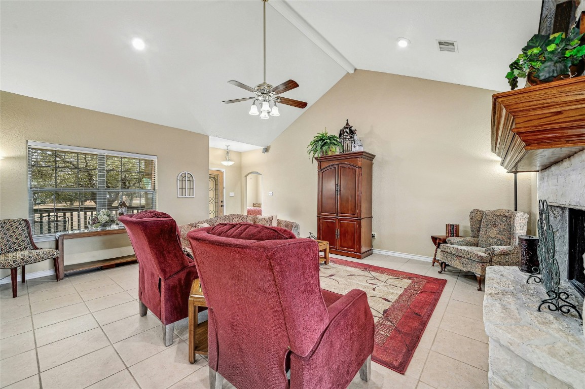 1370 Sunset View Fischer, TX 78623 - Photo 6 of 28 a living room with furniture a ceiling fan and a window