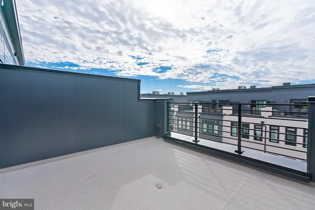 a view of a balcony with an outdoor space