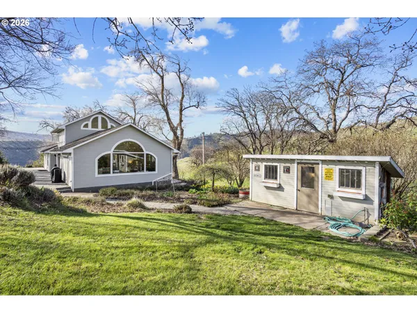 a view of kitchen with wooden floor