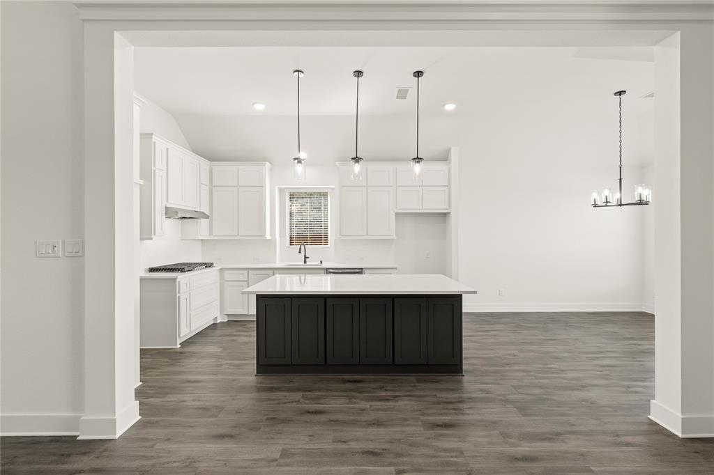 1314 Comal Drive Forney, TX 75126 - Photo 7 of 30 a view of kitchen with wooden floor