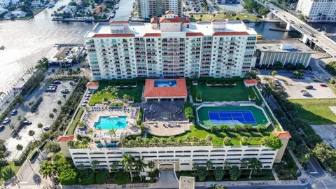 an aerial view of a city with lots of residential buildings