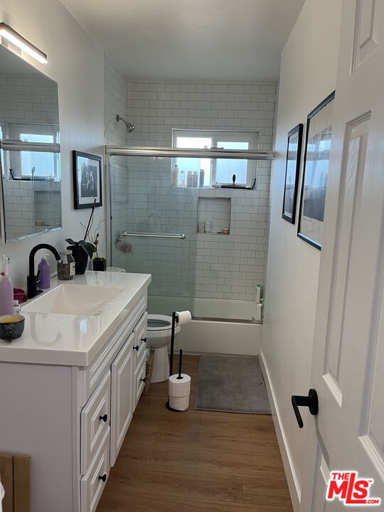 3824 Keystone Avenue, Unit 7 Culver City, CA 90232 - Photo 4 of 8 a bathroom with a sink a toilet and shower