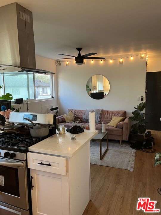 3824 Keystone Avenue, Unit 7 Culver City, CA 90232 - Photo 5 of 8 a kitchen with a sink a stove and cabinets