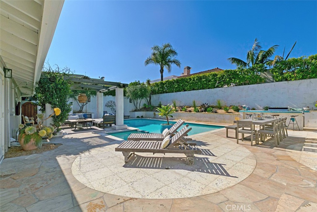 609 Seaward Road Corona del Mar, CA 92625 - Photo 20 of 22 an outdoor sitting area with couch