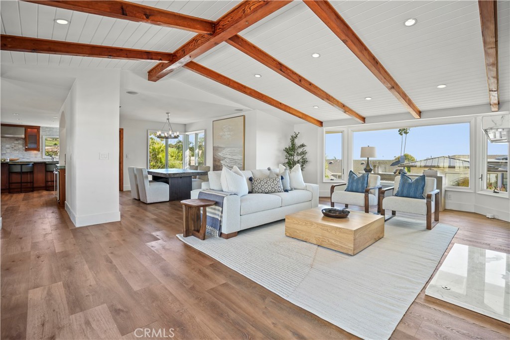 609 Seaward Road Corona del Mar, CA 92625 - Photo 5 of 22 a living room with furniture and wooden floor