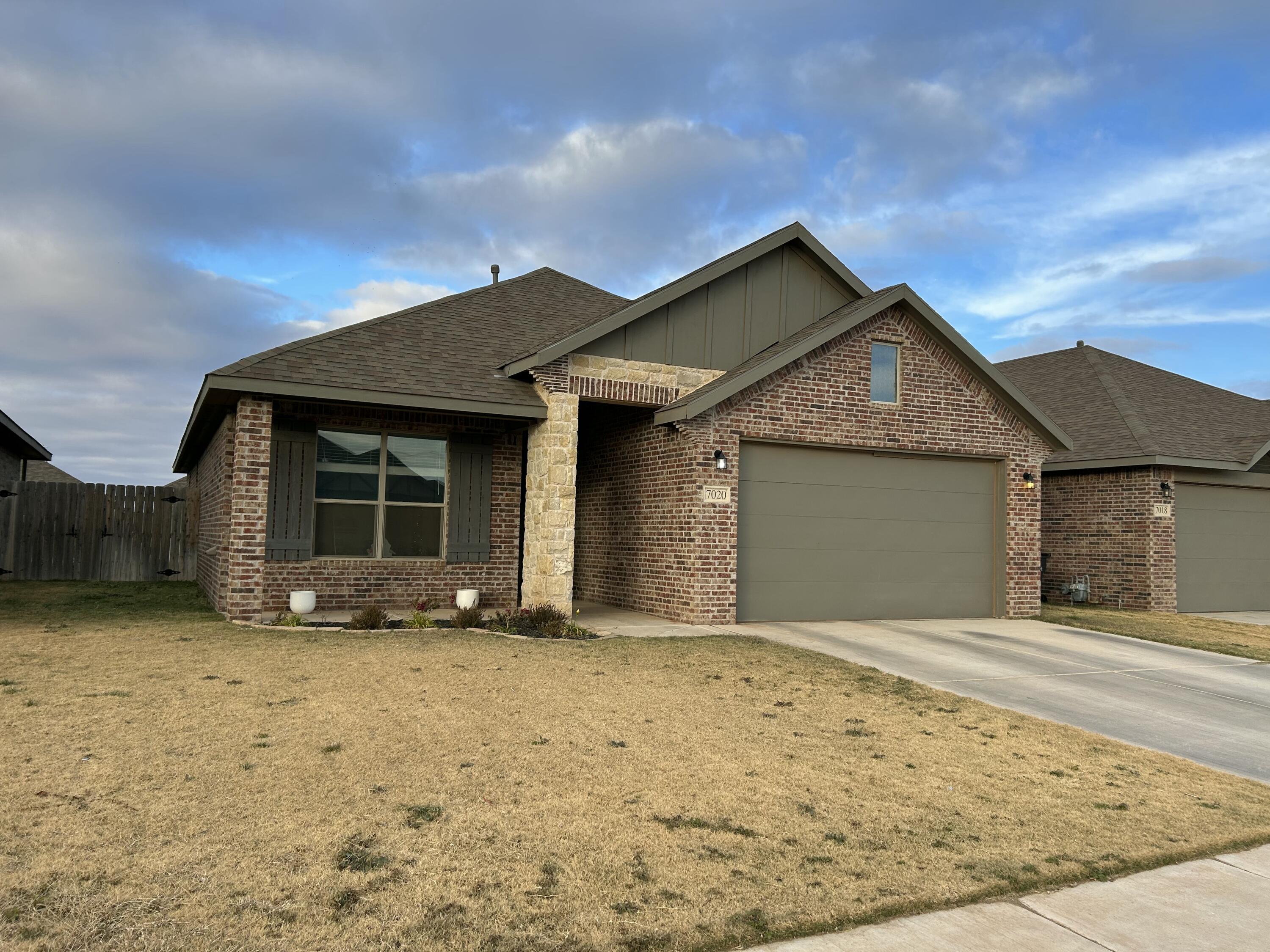 7020 22nd Street Lubbock, TX 79407 - Photo 2 of 28 front view of a house