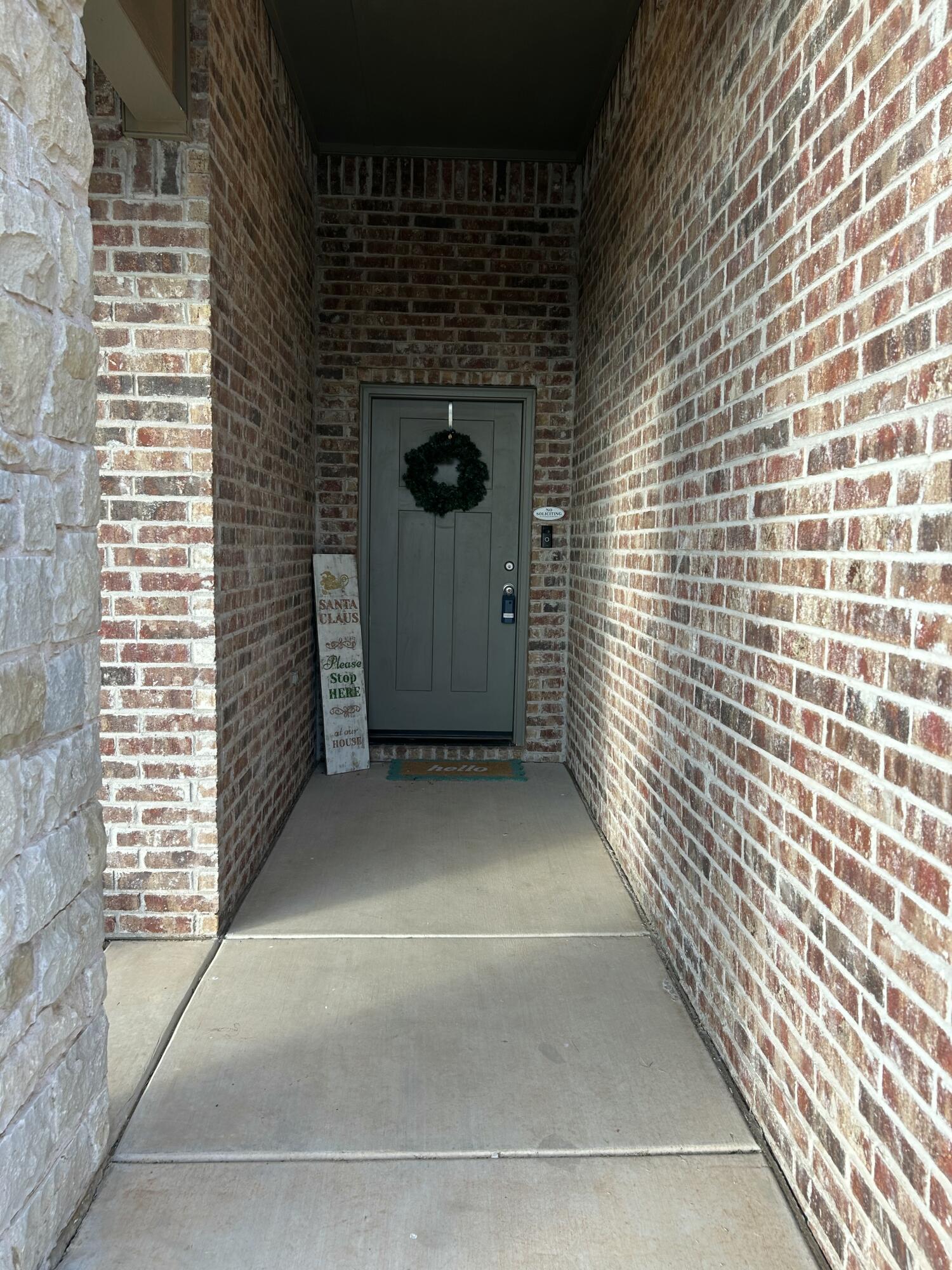 7020 22nd Street Lubbock, TX 79407 - Photo 5 of 28 a view of a door of a house