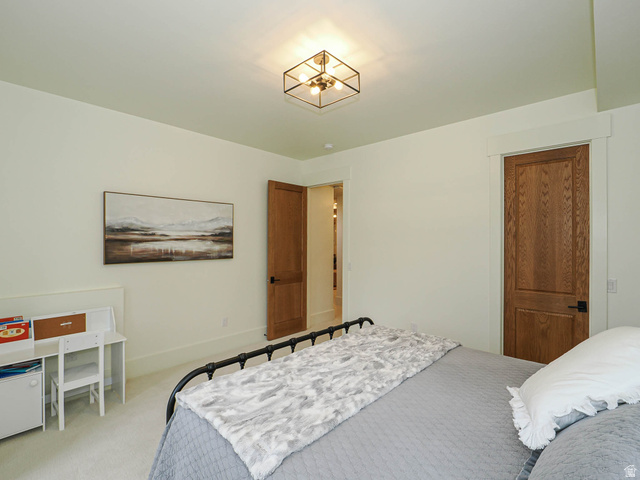 3167 South Mapleton Ests Drive Mapleton, UT 84664 - Photo 27 of 43 Interior room featuring light-toned walls and plush carpet flooring